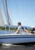 Shoreline Lake Summer Sailstice Celebration (young girl skippering sailboat ride on Capri dinghy)